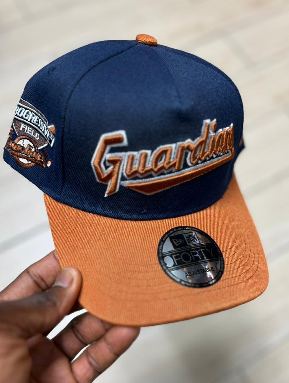 NEW ERA CLEVELAND GUARDIANS PROGRESSIVE FIELD COPPER TWO TONE 9FORTY A FRAME SNAPBACK CAP