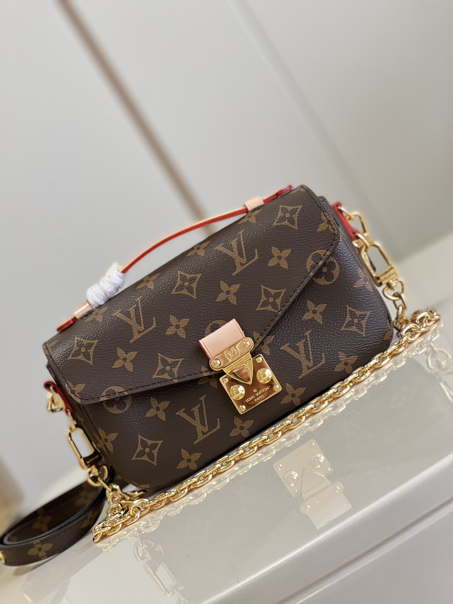 Pochette Métis East West M46279