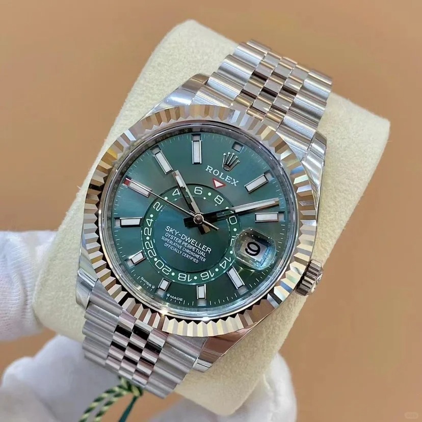 The Oyster Perpetual Sky-Dweller is available in white gold and Oystersteel with a mint green dial and a Jubilee bracelet. -m336934-0002 42mm