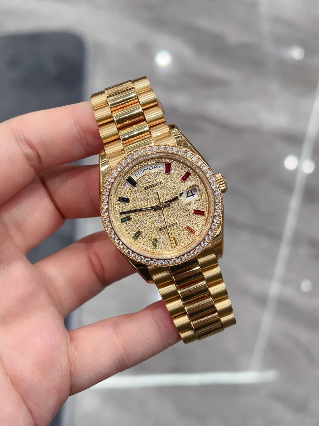 The Oyster Perpetual Day-Date 36 in 18 ct yellow gold with a diamond-paved dial, diamond-set bezel and President bracelet. -m128398tbr-0012