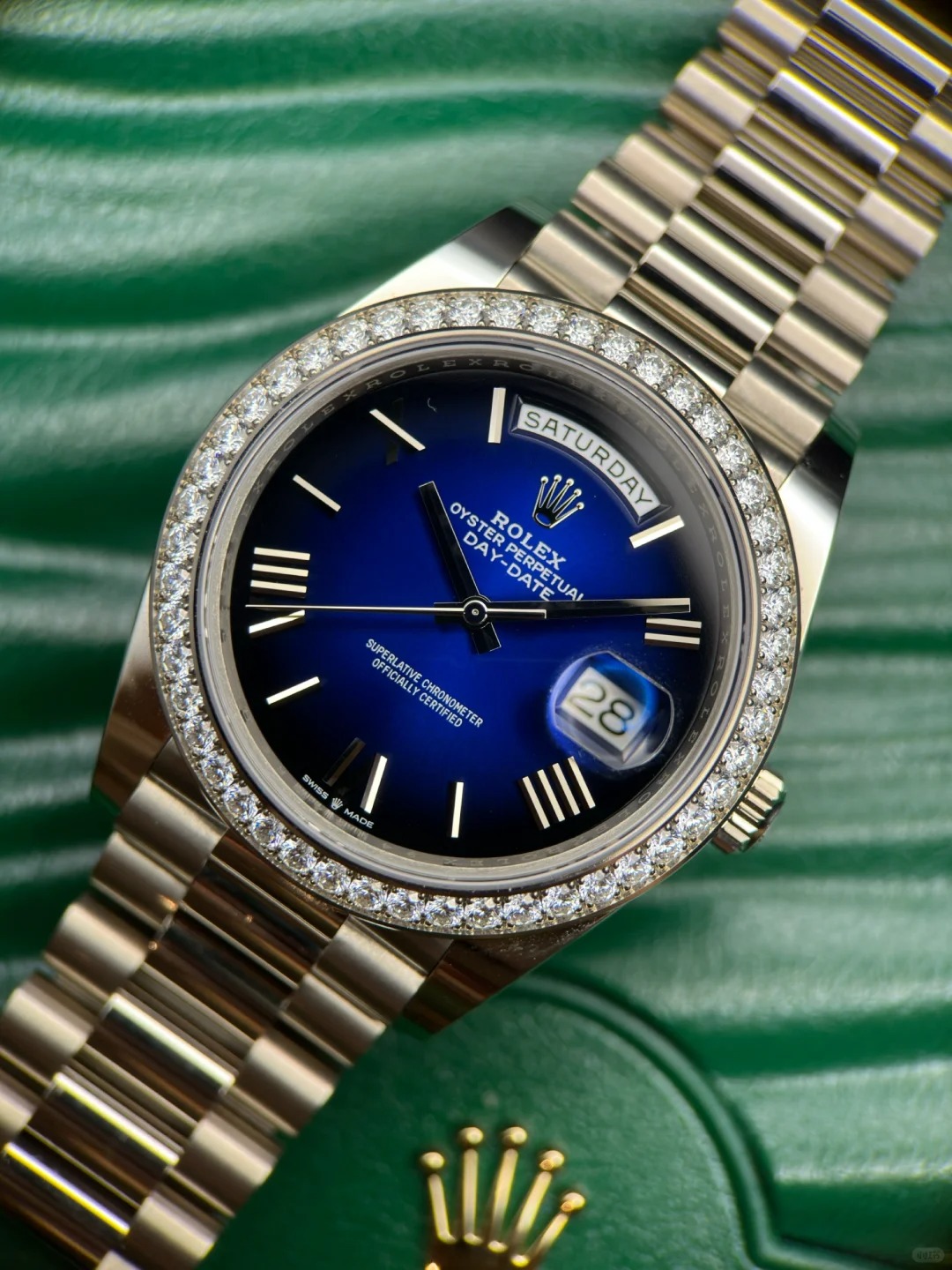 The Oyster Perpetual Day-Date 40 in 18 ct white gold with a graduated blue dial, diamond-set bezel and President bracelet. -m228349rbr-0045