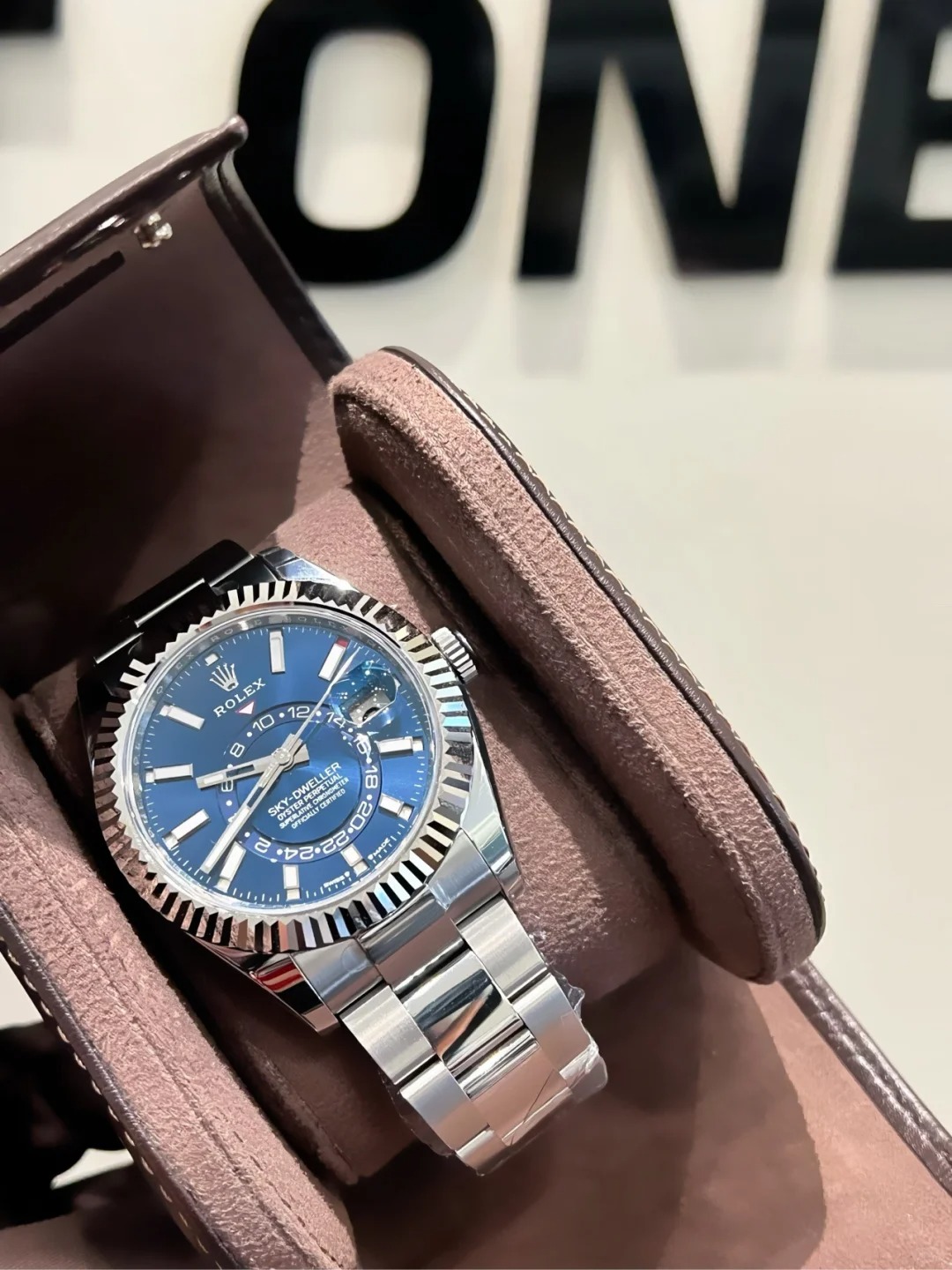 The Oyster Perpetual Sky-Dweller is available in white gold and Oystersteel with a bright blue dial and an Oyster bracelet. -m336934-0005 42mm