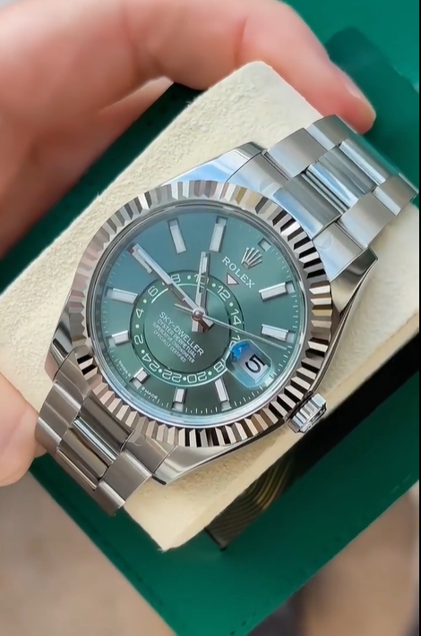 The Oyster Perpetual Sky-Dweller is available in white gold and Oysteel with a mint green dial and an Oyster bracelet. -m336934-0001 42mm