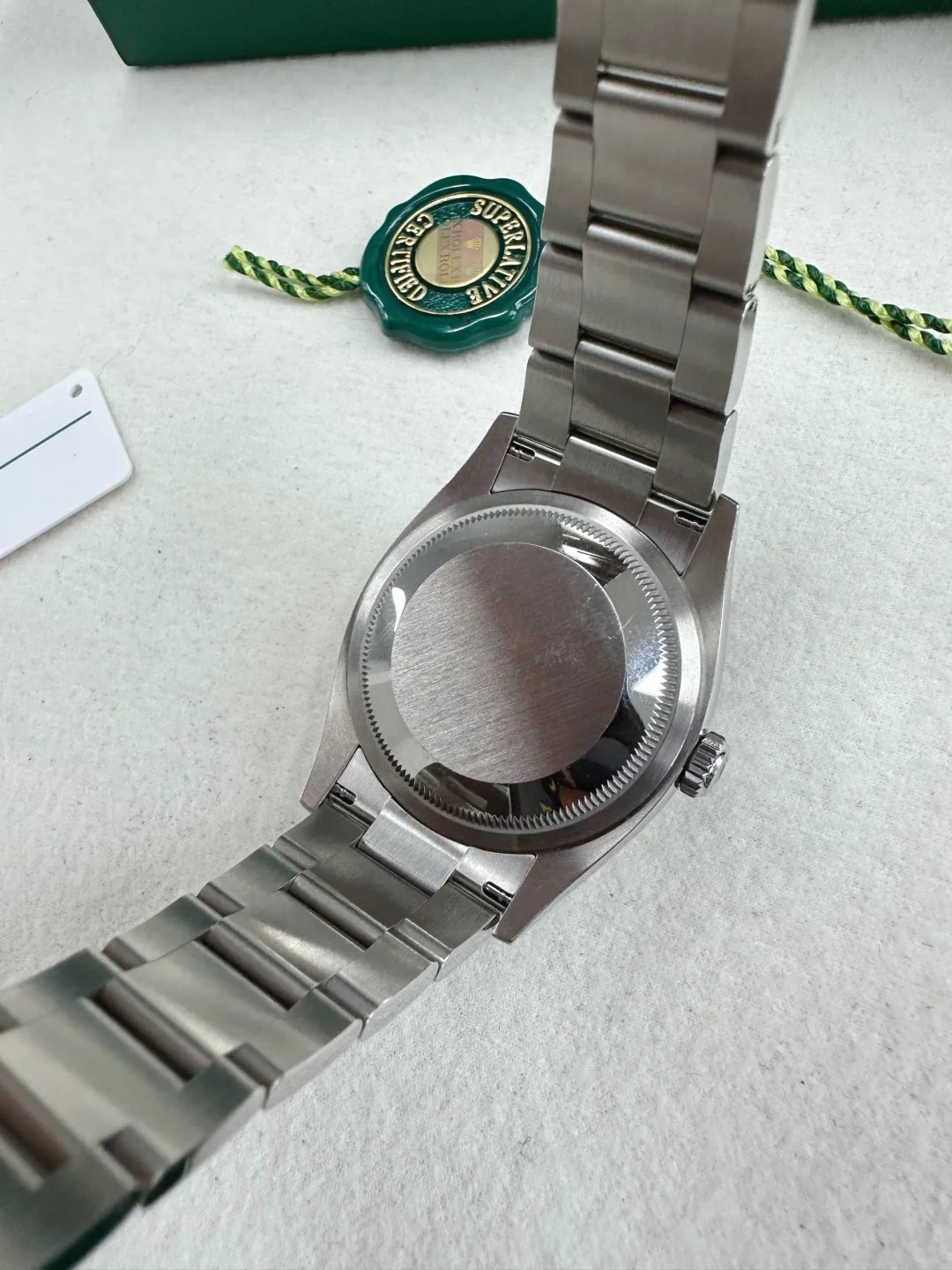 The Oyster Perpetual 36 is presented with a green dial and an Oyster bracelet. -m126000-0005