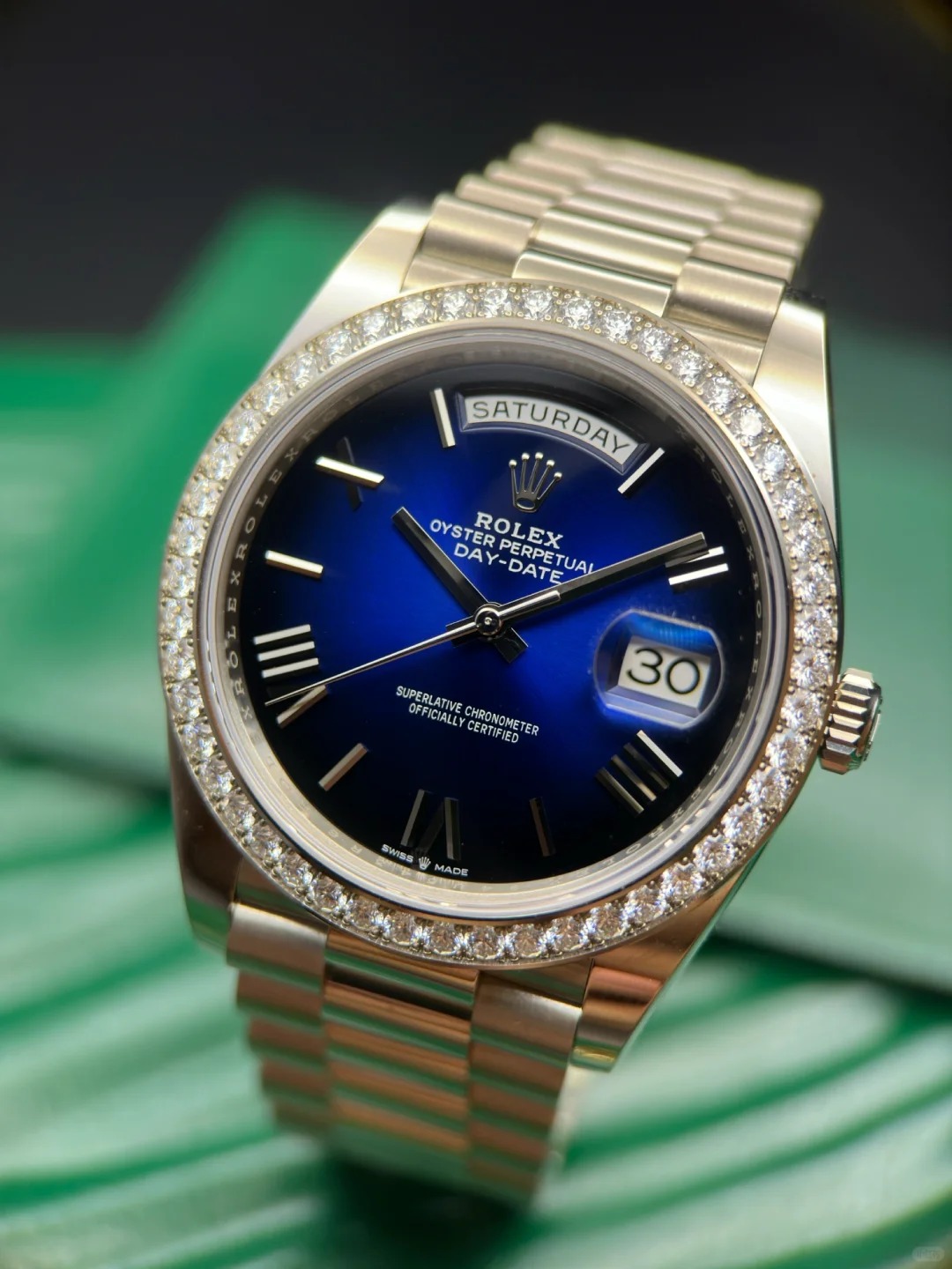 The Oyster Perpetual Day-Date 40 in 18 ct white gold with a graduated blue dial, diamond-set bezel and President bracelet. -m228349rbr-0045