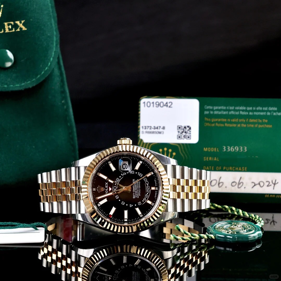 The Oyster Perpetual Sky-Dweller in yellow gold and Oystersteel with a glossy black dial and a Jubilee bracelet. -m336933-0004 42mm