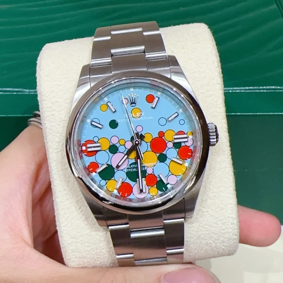 The Oyster Perpetual 36 features a turquoise blue celebration dial and an Oyster bracelet. -m126000-0009