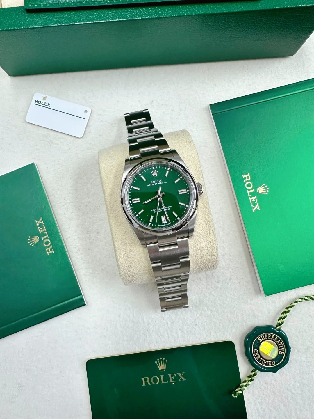 The Oyster Perpetual 36 is presented with a green dial and an Oyster bracelet. -m126000-0005