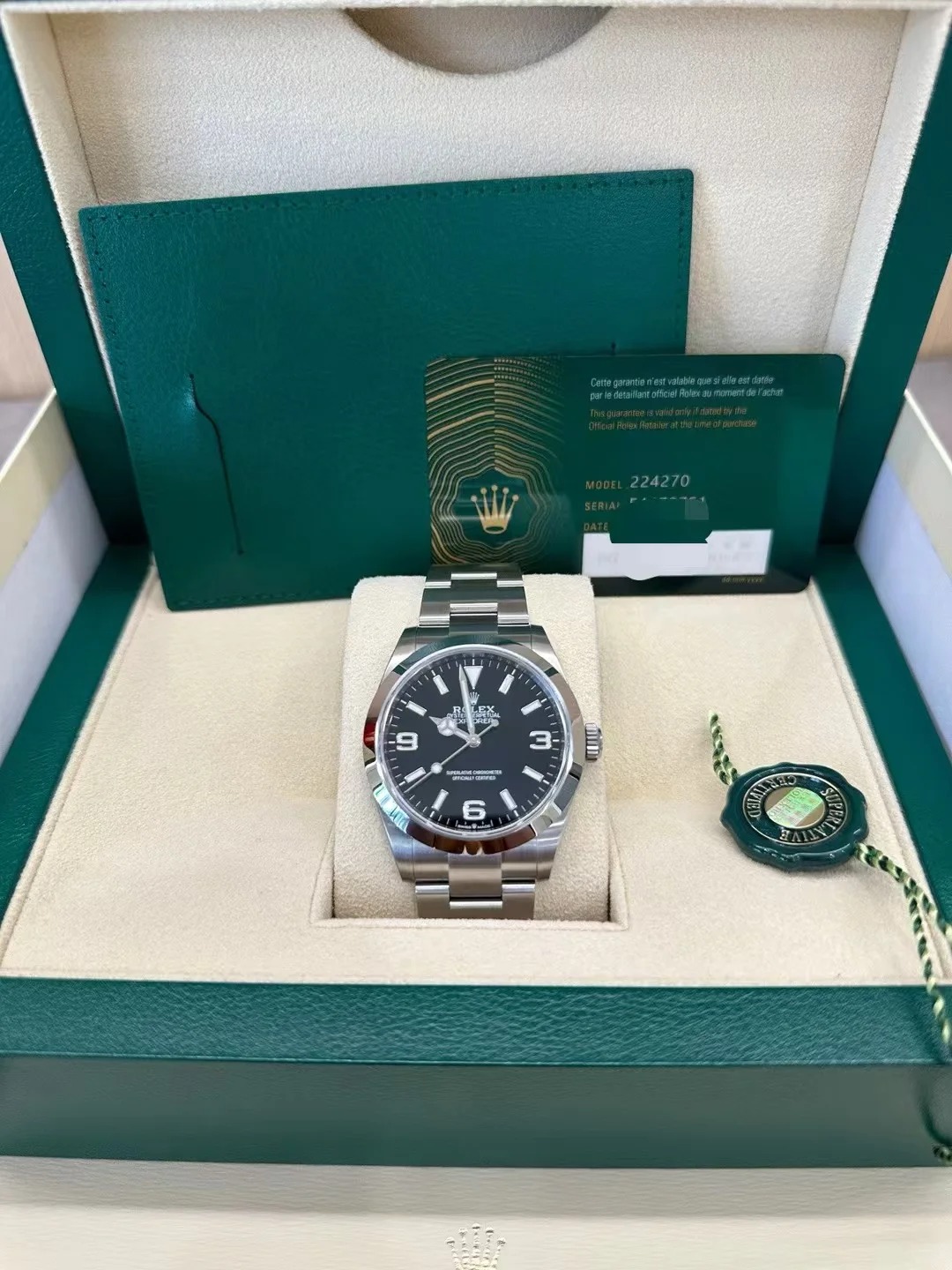 The Oyster Perpetual Explorer 40 is made of Oyster steel with a distinctive black dial featuring the 3, 6 and 9 numerals coated with Chromalight. -m224270-0001