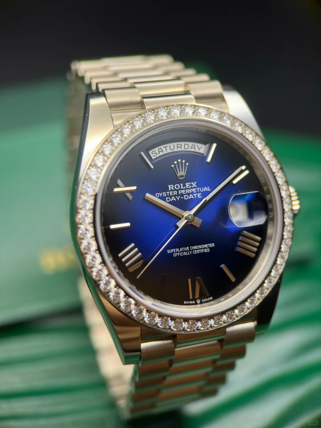 The Oyster Perpetual Day-Date 40 in 18 ct white gold with a graduated blue dial, diamond-set bezel and President bracelet. -m228349rbr-0045