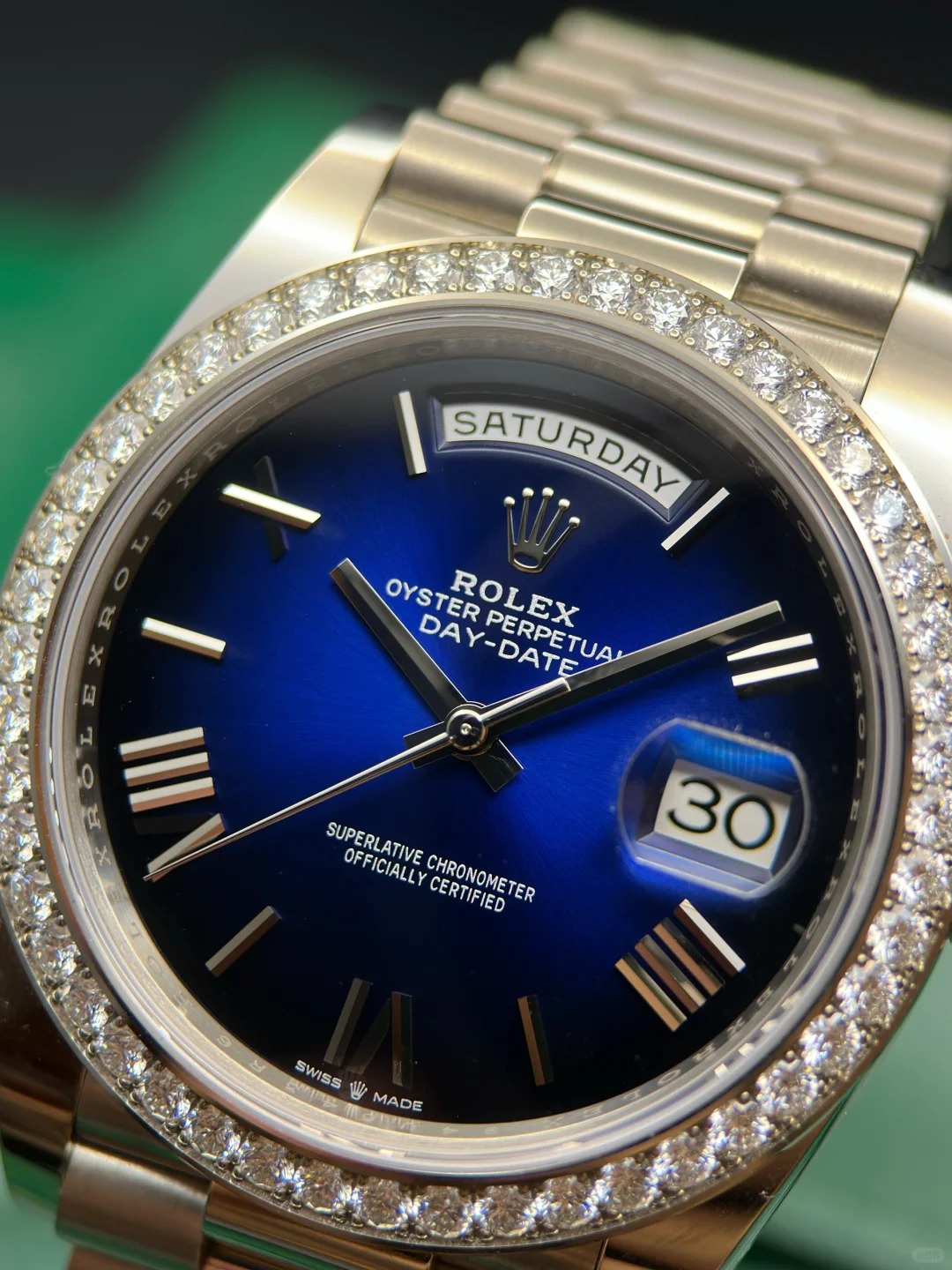 The Oyster Perpetual Day-Date 40 in 18 ct white gold with a graduated blue dial, diamond-set bezel and President bracelet. -m228349rbr-0045