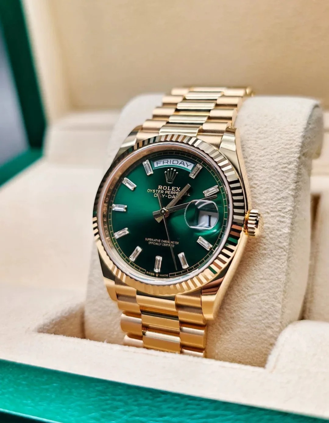 The Oyster Perpetual Day-Date 36 in 18 ct yellow gold with a brilliant green diamond-set dial, fluted bezel and President bracelet. -m128238-0130