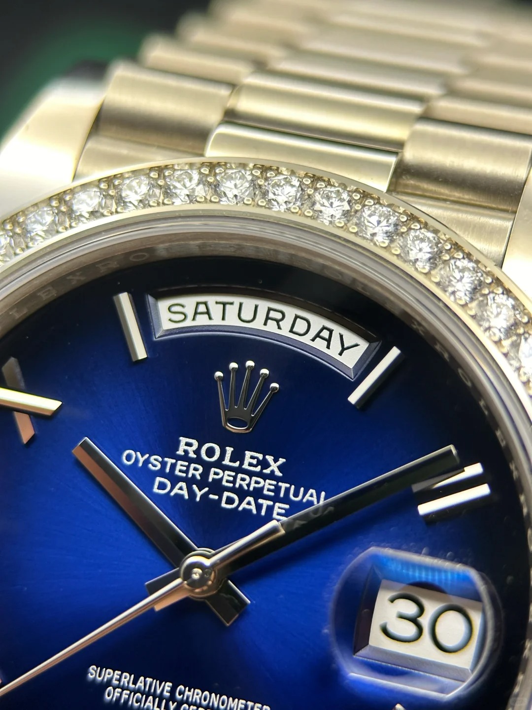 The Oyster Perpetual Day-Date 40 in 18 ct white gold with a graduated blue dial, diamond-set bezel and President bracelet. -m228349rbr-0045