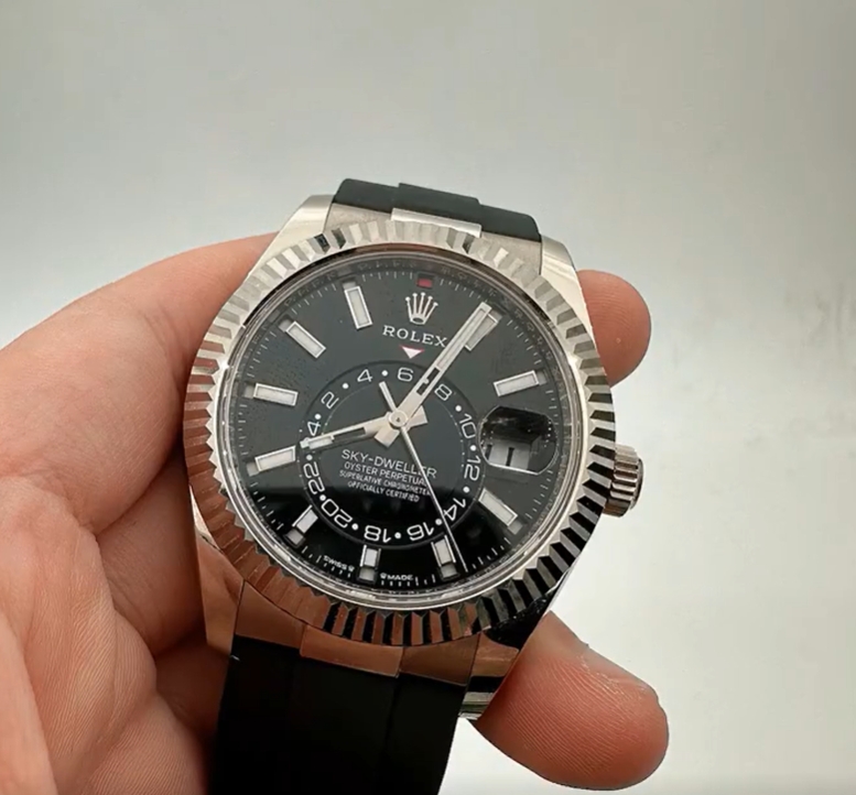 The Oyster Perpetual Sky-Dweller is available in 18 ct white gold with a glossy black dial and an Oysterflex strap. -m336239-0002 42mm