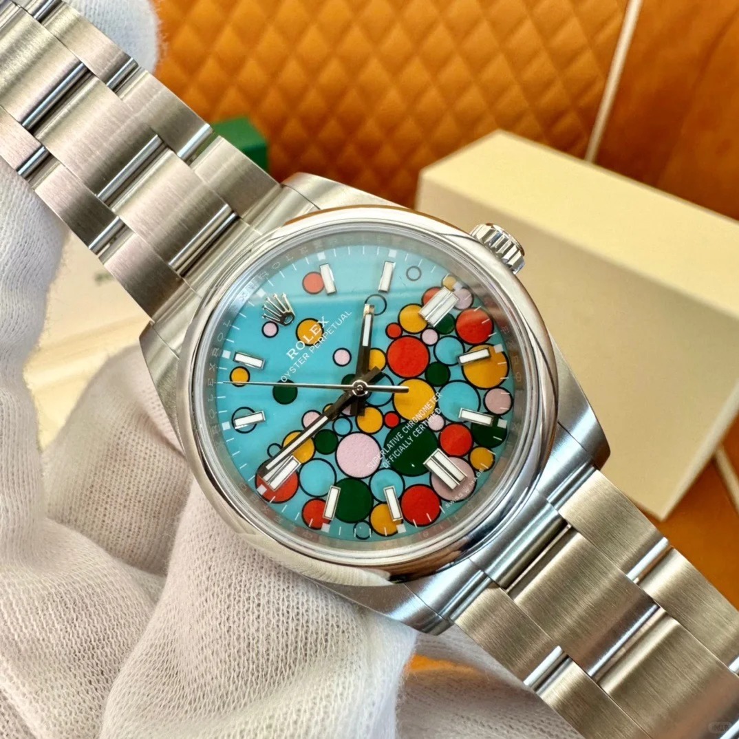 The Oyster Perpetual 36 features a turquoise blue celebration dial and an Oyster bracelet. -m126000-0009