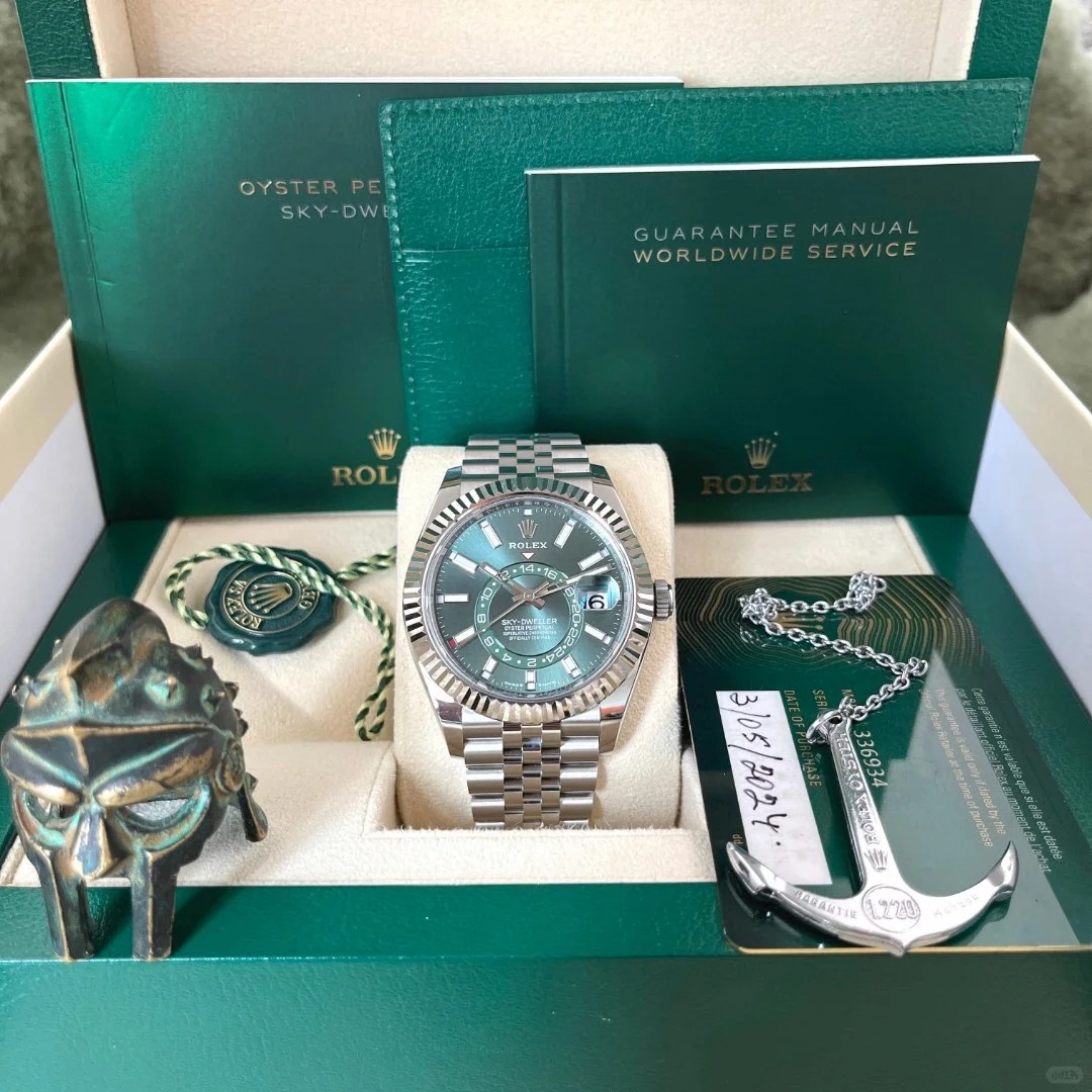 The Oyster Perpetual Sky-Dweller is available in white gold and Oystersteel with a mint green dial and a Jubilee bracelet. -m336934-0002 42mm