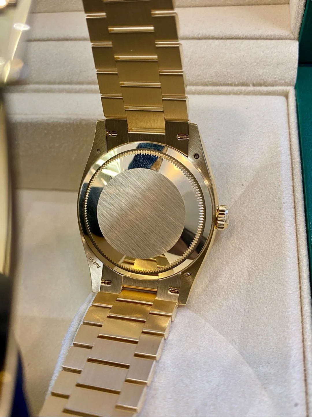 The Oyster Perpetual Day-Date 36 in 18 ct yellow gold with a brilliant green diamond-set dial, fluted bezel and President bracelet. -m128238-0130