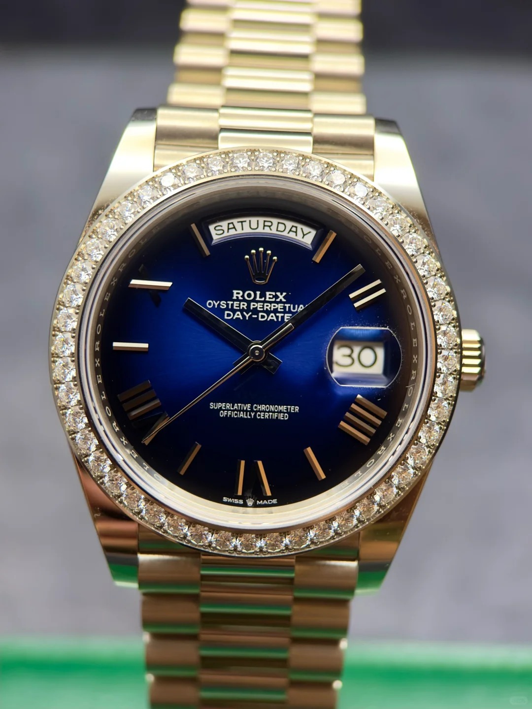 The Oyster Perpetual Day-Date 40 in 18 ct white gold with a graduated blue dial, diamond-set bezel and President bracelet. -m228349rbr-0045