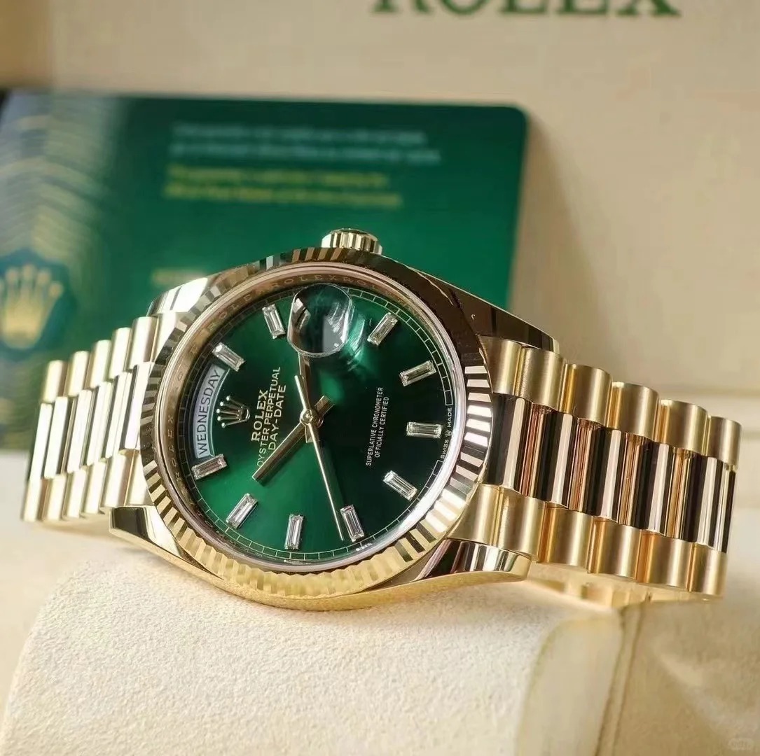 The Oyster Perpetual Day-Date 36 in 18 ct yellow gold with a brilliant green diamond-set dial, fluted bezel and President bracelet. -m128238-0130
