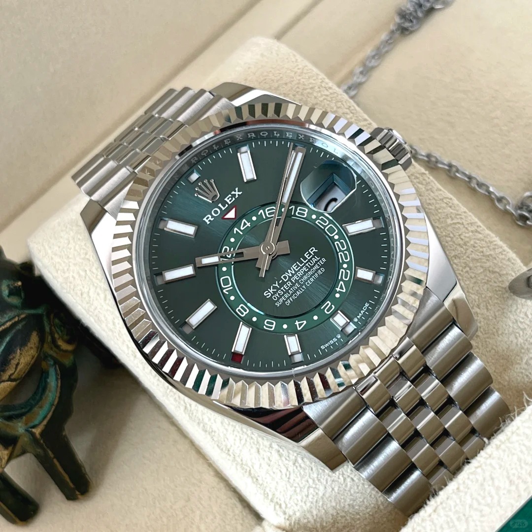 The Oyster Perpetual Sky-Dweller is available in white gold and Oystersteel with a mint green dial and a Jubilee bracelet. -m336934-0002 42mm