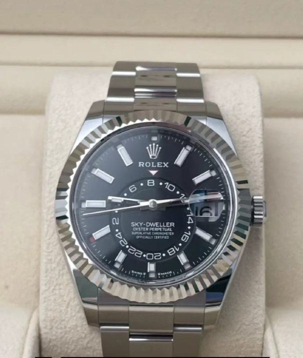 The Oyster Perpetual Sky-Dweller is available in white gold and Oysteel, with a glossy black dial and an Oyster bracelet. -m336934-0007 42mm