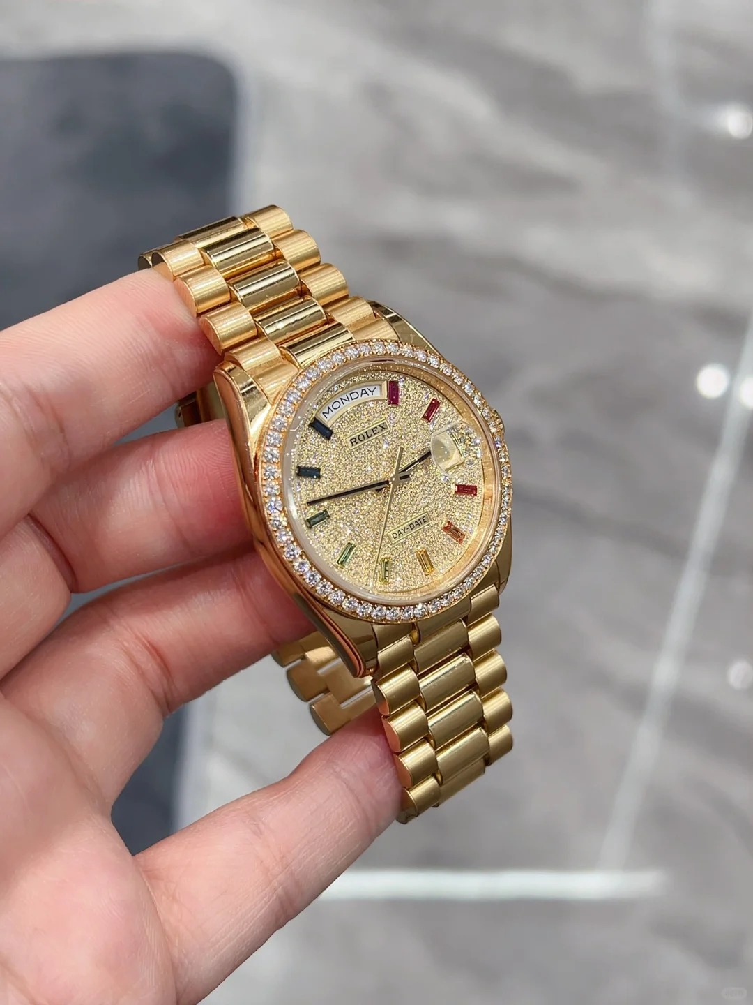 The Oyster Perpetual Day-Date 36 in 18 ct yellow gold with a diamond-paved dial, diamond-set bezel and President bracelet. -m128398tbr-0012