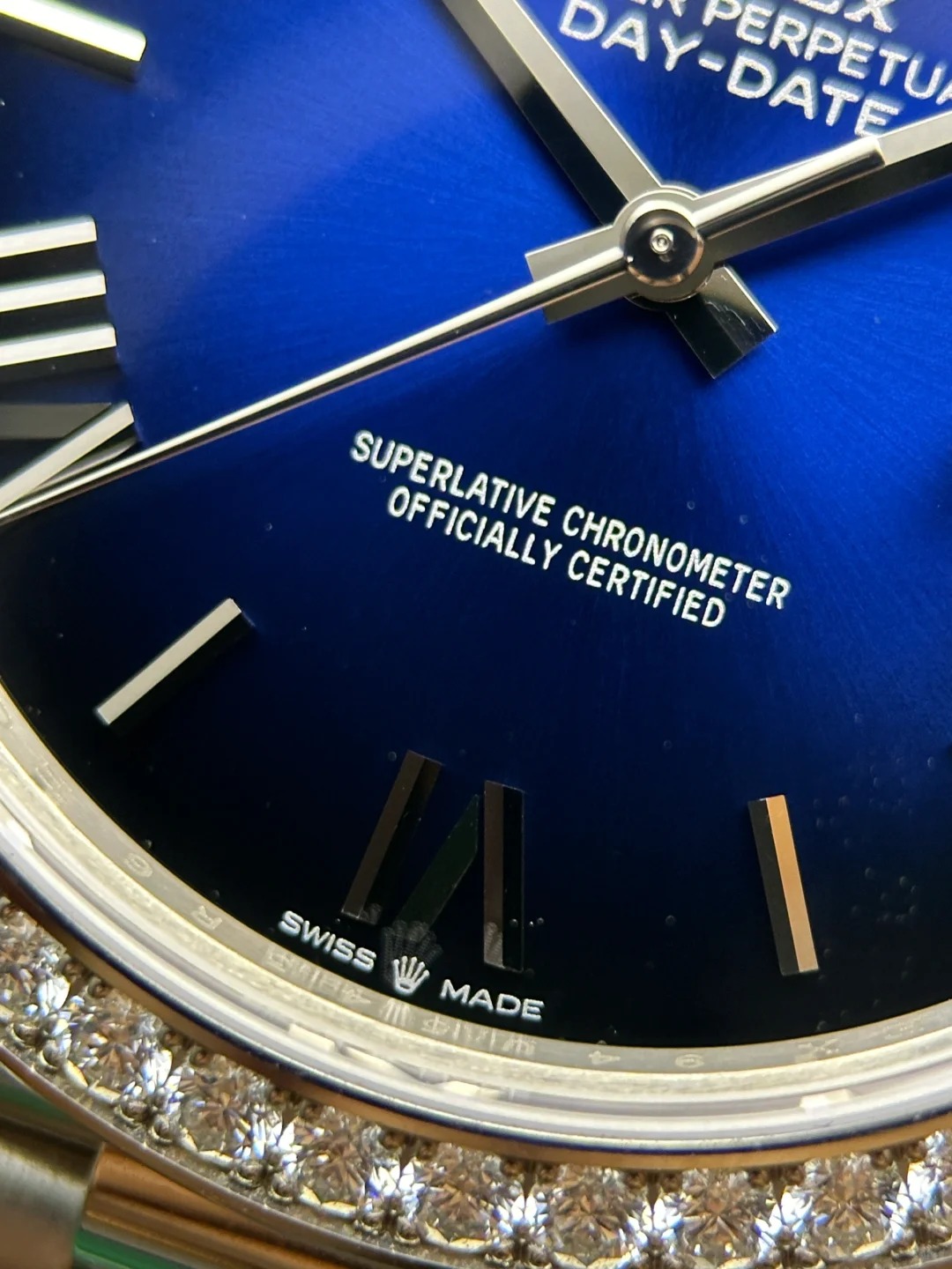 The Oyster Perpetual Day-Date 40 in 18 ct white gold with a graduated blue dial, diamond-set bezel and President bracelet. -m228349rbr-0045