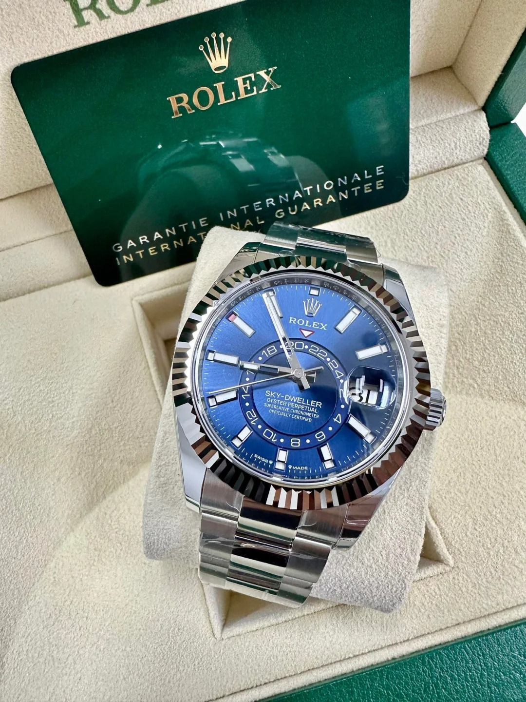 The Oyster Perpetual Sky-Dweller is available in white gold and Oystersteel with a bright blue dial and an Oyster bracelet. -m336934-0005 42mm