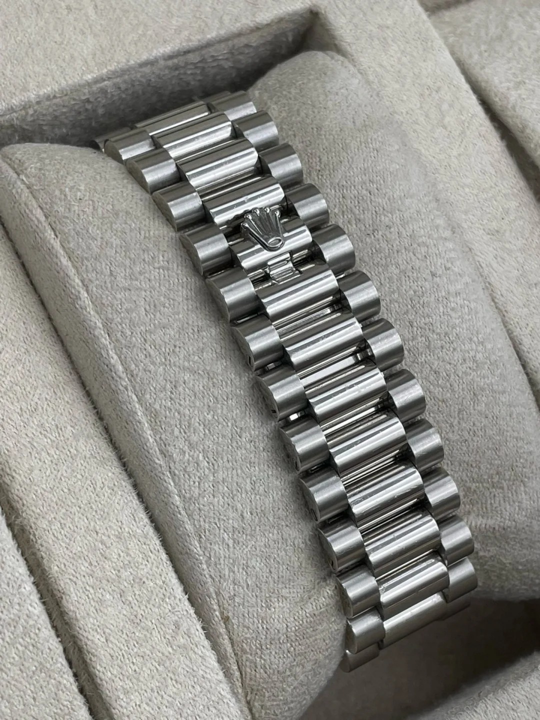 The Oyster Perpetual Day-Date 36 in platinum with an ice-blue dial, fluted bezel and President bracelet. -m128236-0018