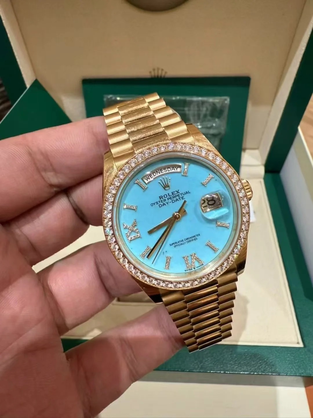 The Oyster Perpetual Day-Date 36 in 18 ct yellow gold with a diamond-set turquoise dial, diamond-set bezel and President bracelet. -m128398tbr-0014