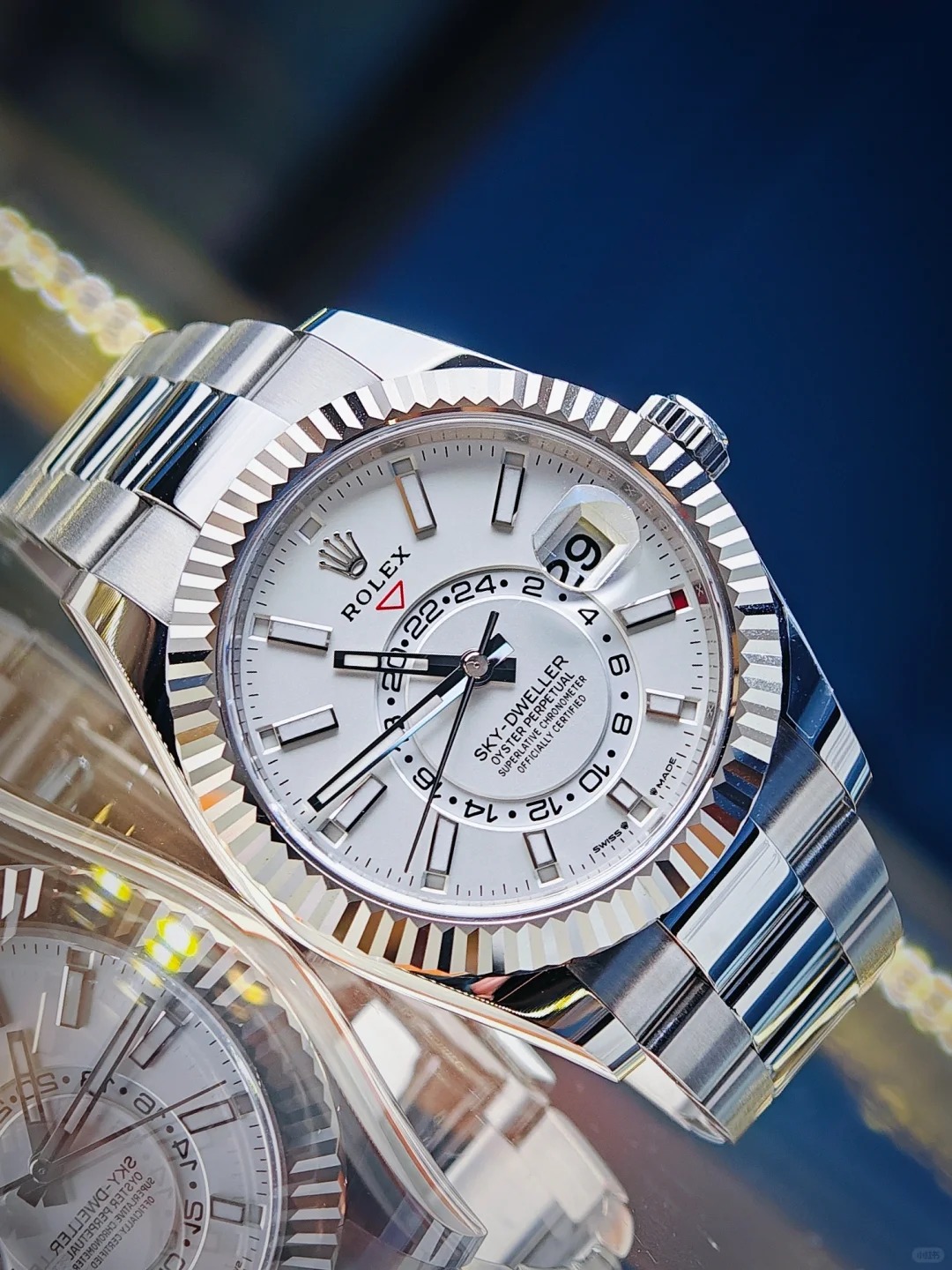 The Oyster Perpetual Sky-Dweller is available in white gold and Oyster steel with a mellow white dial and Oyster bracelet. -m336934-0003 42mm