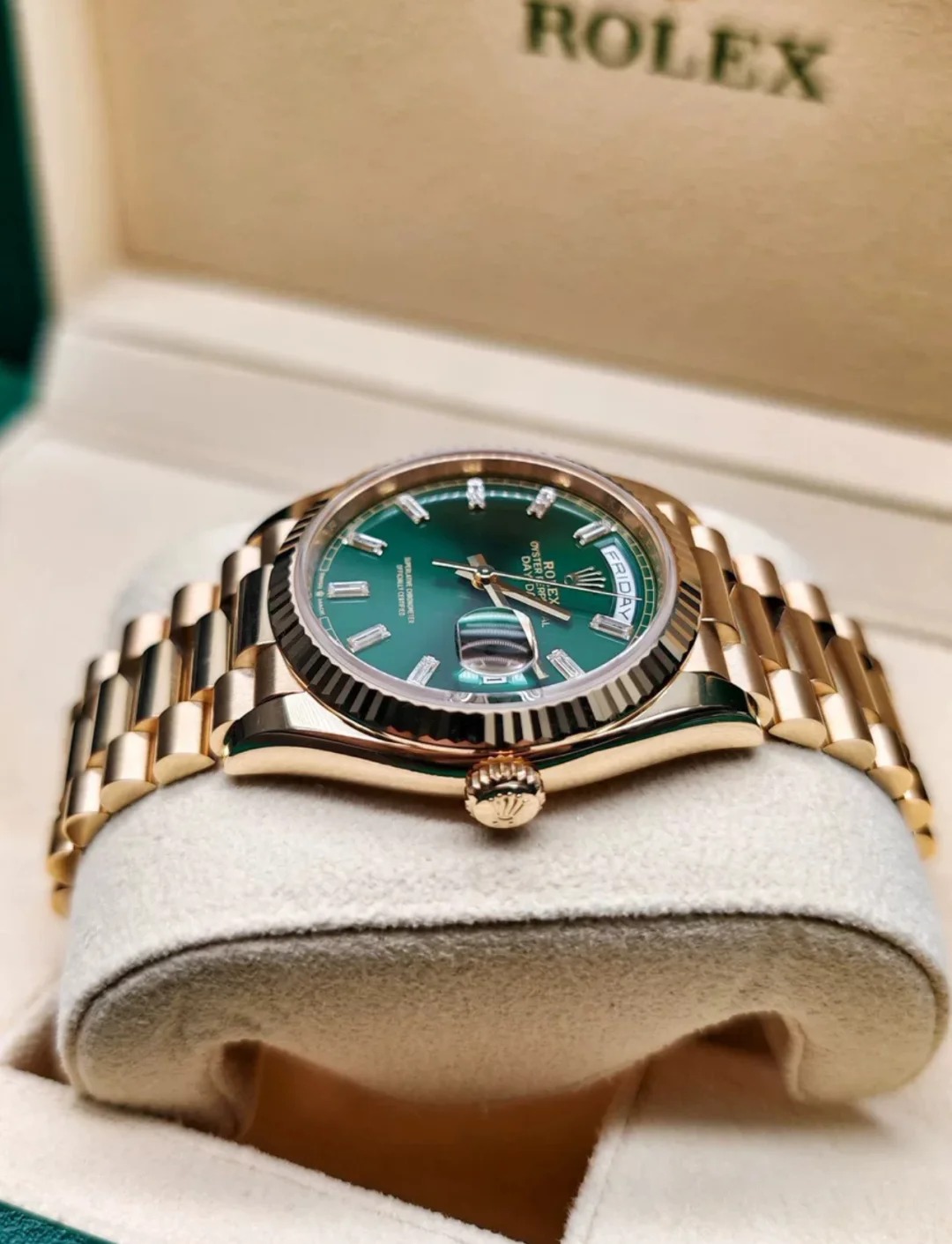 The Oyster Perpetual Day-Date 36 in 18 ct yellow gold with a brilliant green diamond-set dial, fluted bezel and President bracelet. -m128238-0130