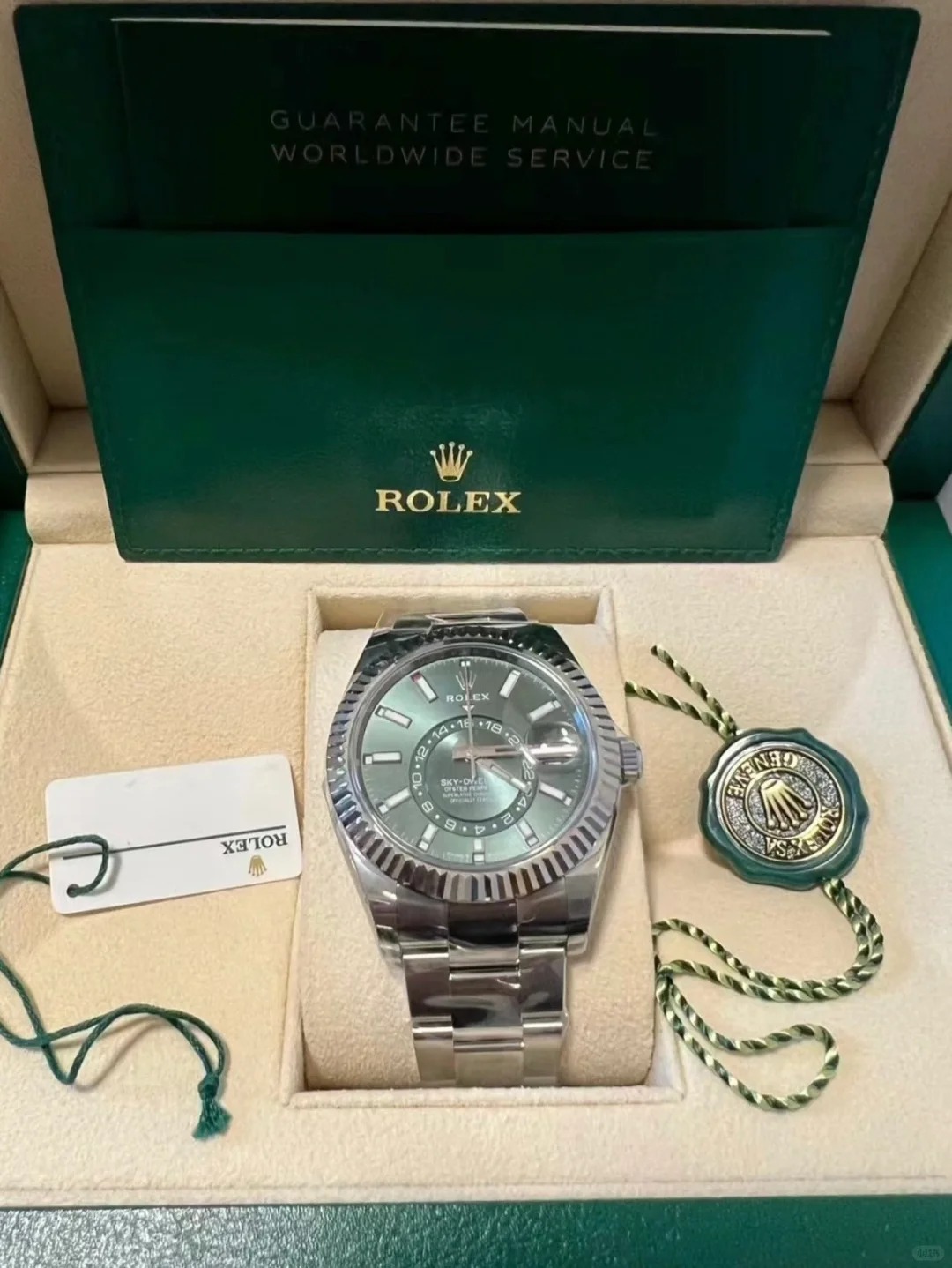 The Oyster Perpetual Sky-Dweller is available in white gold and Oysteel with a mint green dial and an Oyster bracelet. -m336934-0001 42mm