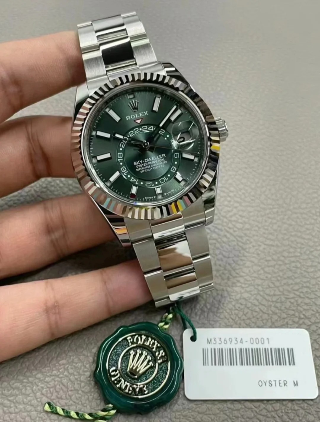 The Oyster Perpetual Sky-Dweller is available in white gold and Oysteel with a mint green dial and an Oyster bracelet. -m336934-0001 42mm