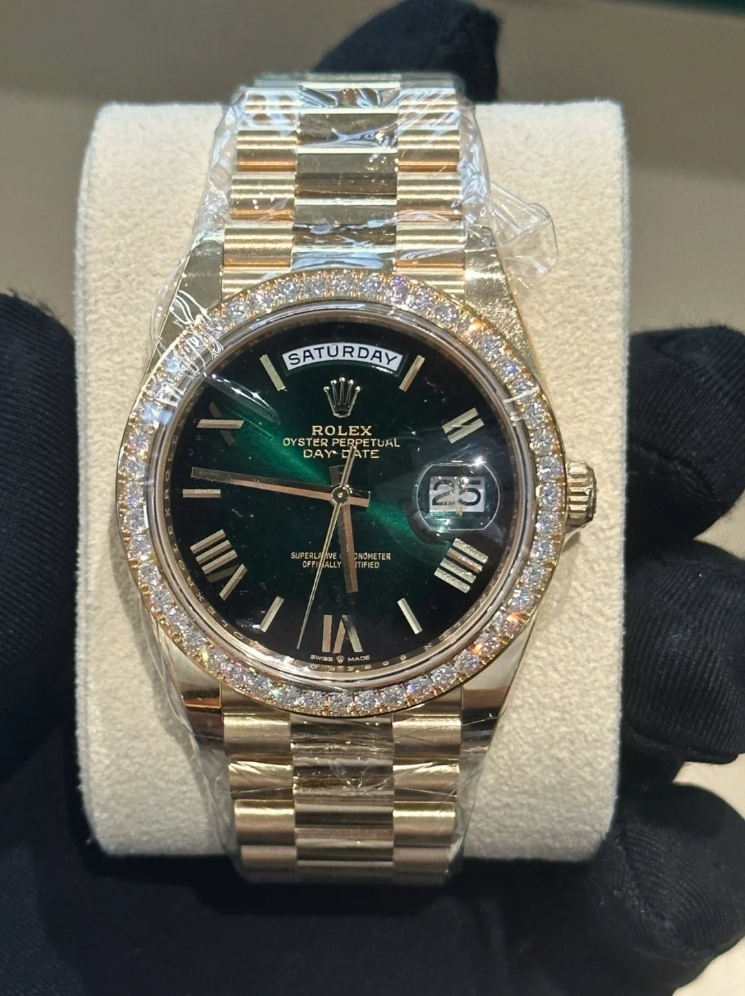 The Oyster Perpetual Day-Date 40 in 18 ct yellow gold with a gradient green dial, diamond-set bezel and President bracelet. -m228348rbr-0045