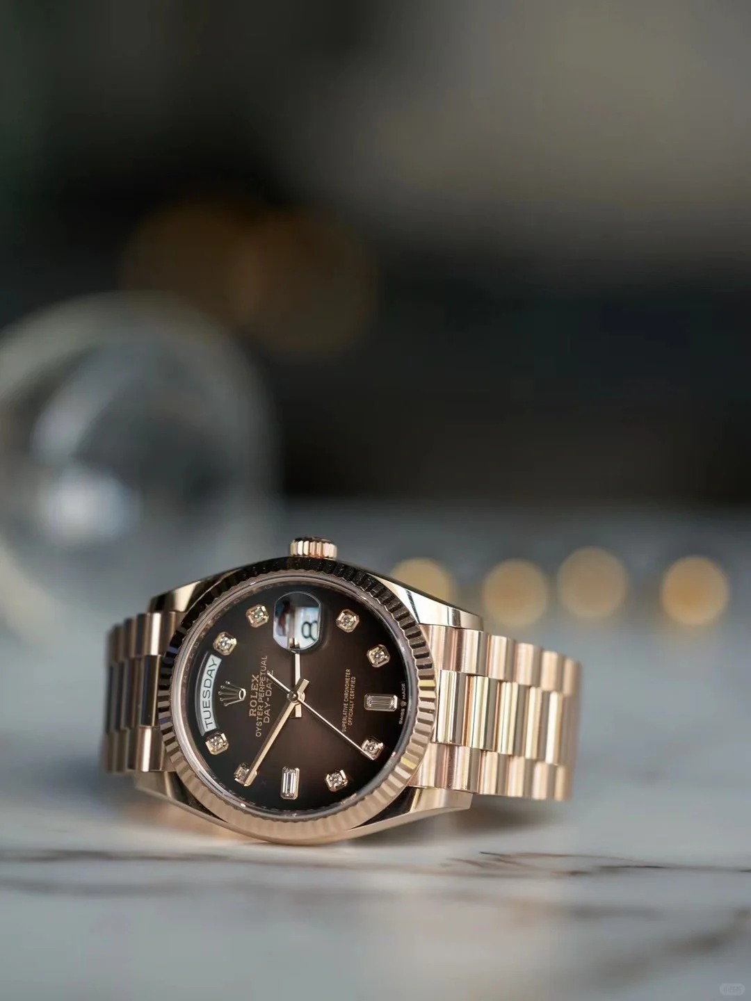 The Oyster Perpetual Day-Date 36 in 18 ct Everose gold with a graduated brown dial, fluted bezel and President bracelet. -m128235-0075