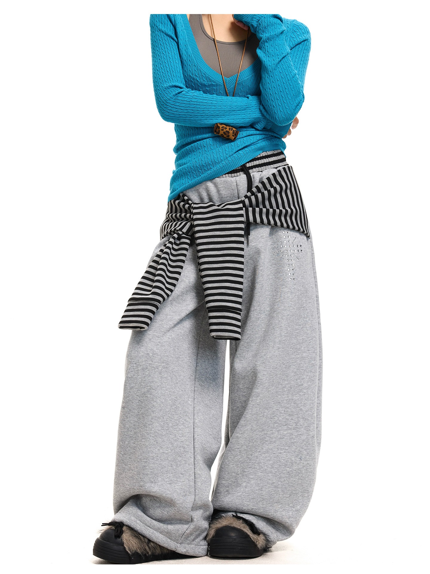 Retro striped wide-leg pants with tie-up detailing, black, loose fit, suitable for winter casual wear.