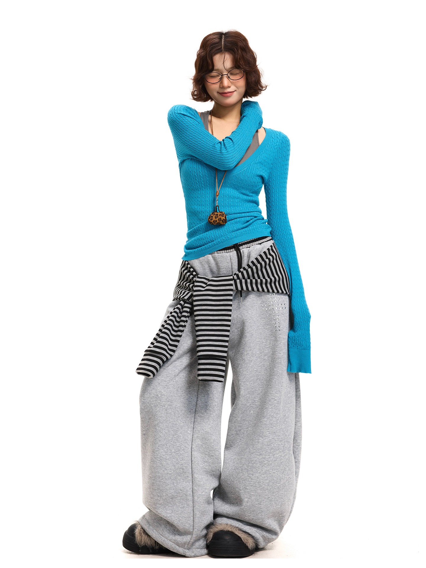 Retro striped wide-leg pants with tie-up detailing, black, loose fit, suitable for winter casual wear.