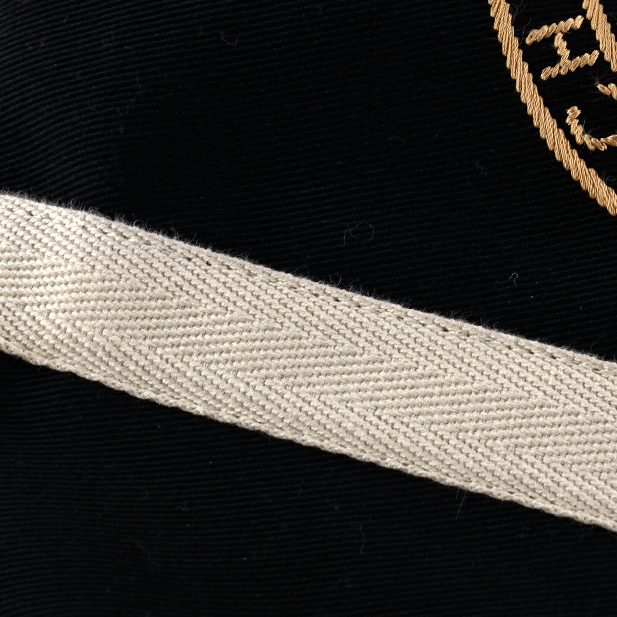 Rive Gauche Drawstring Sling Bag Embroidered Canvas - Deep Luxury