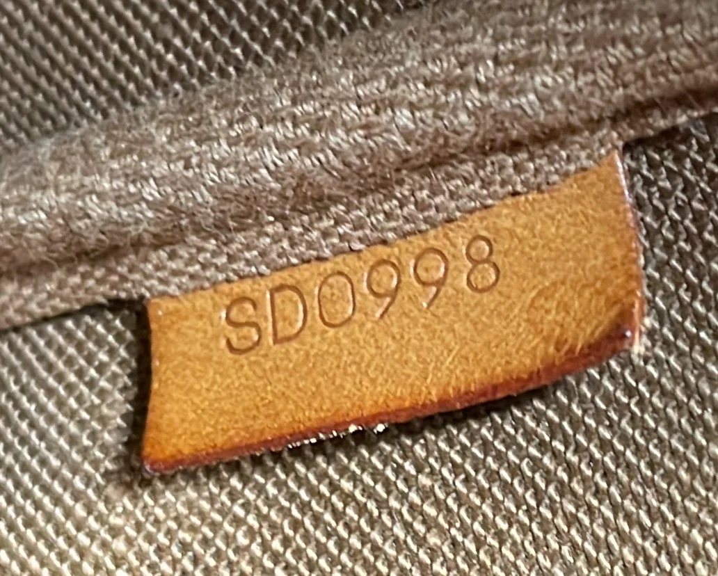 Pochette Accessoires NM Monogram Canvas - Deep Luxury