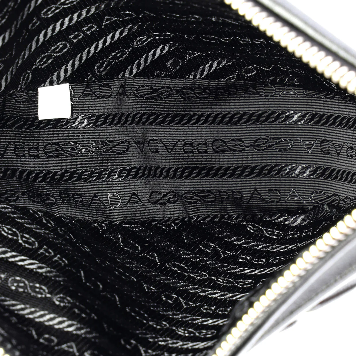 Triangle Logo Wristlet Pouch Embossed Leather - Deep Luxury