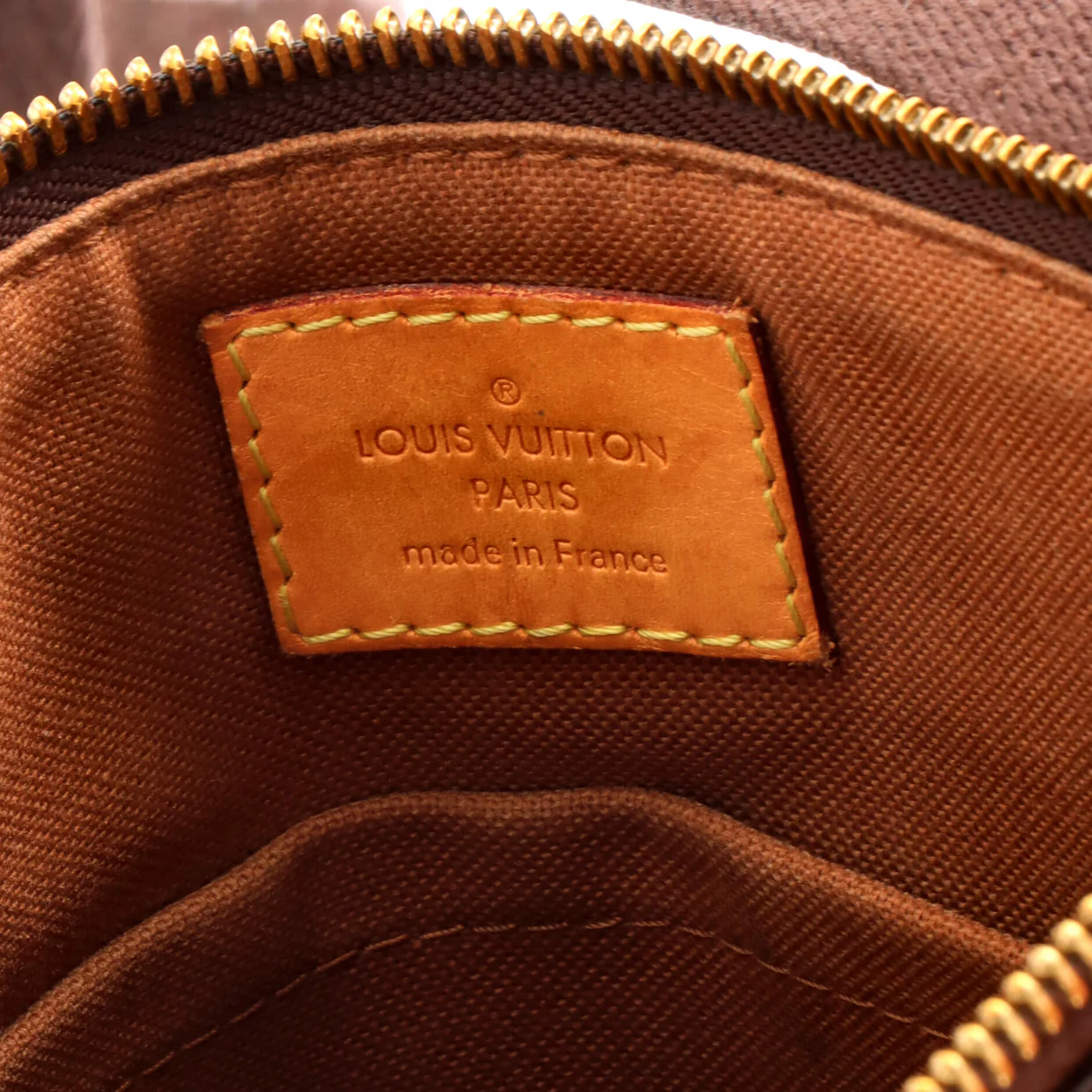 Valmy Pochette Monogram Canvas - Deep Luxury
