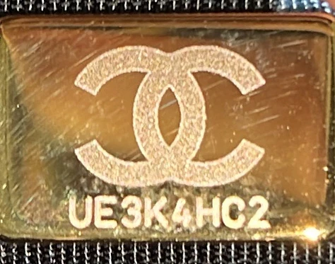 Logo Script Drawstring Chain Backpack Quilted Shiny Lambskin Small - Deep Luxury