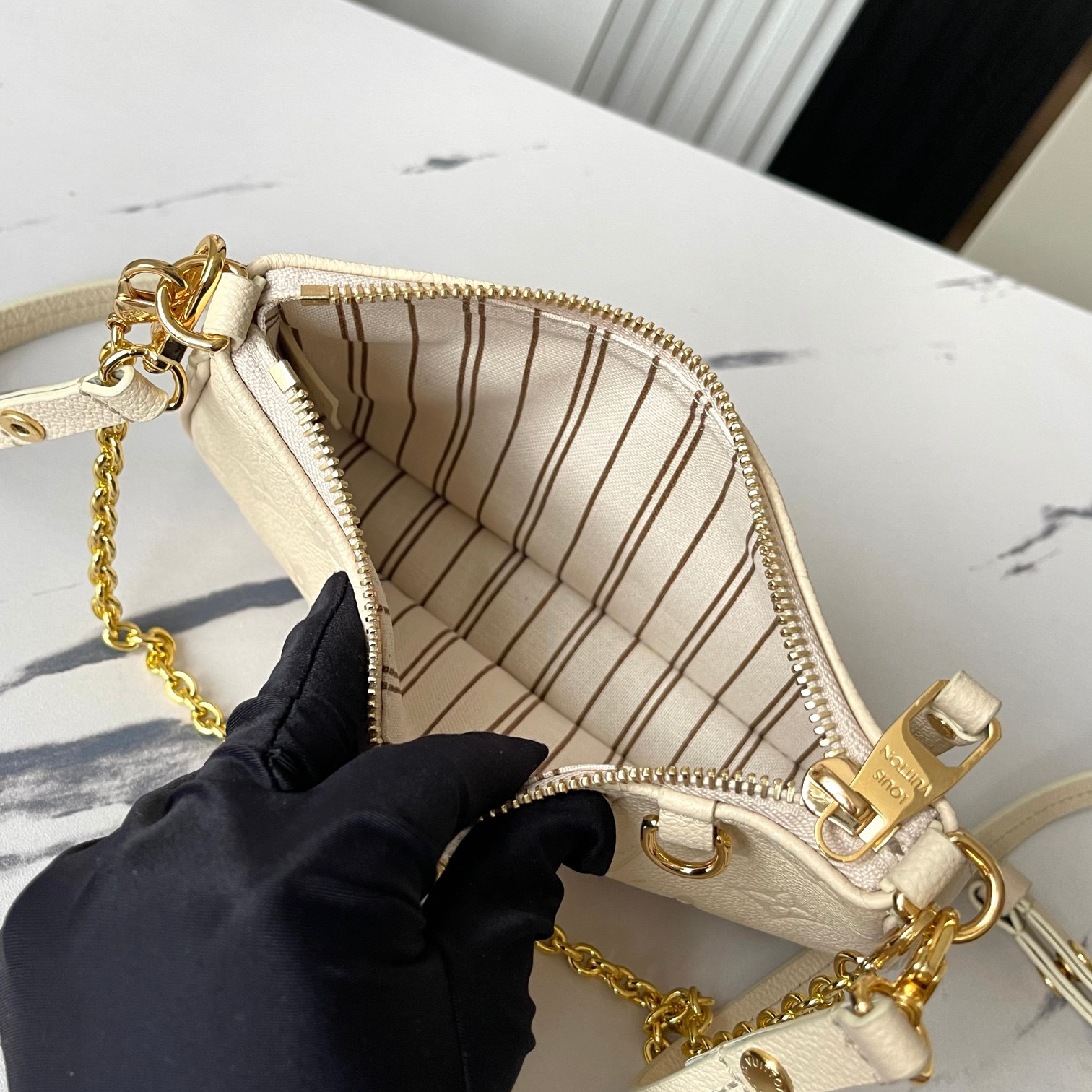 LV - Easy Pouch On Strap Monogram Embossed Leather Shoulder Bag