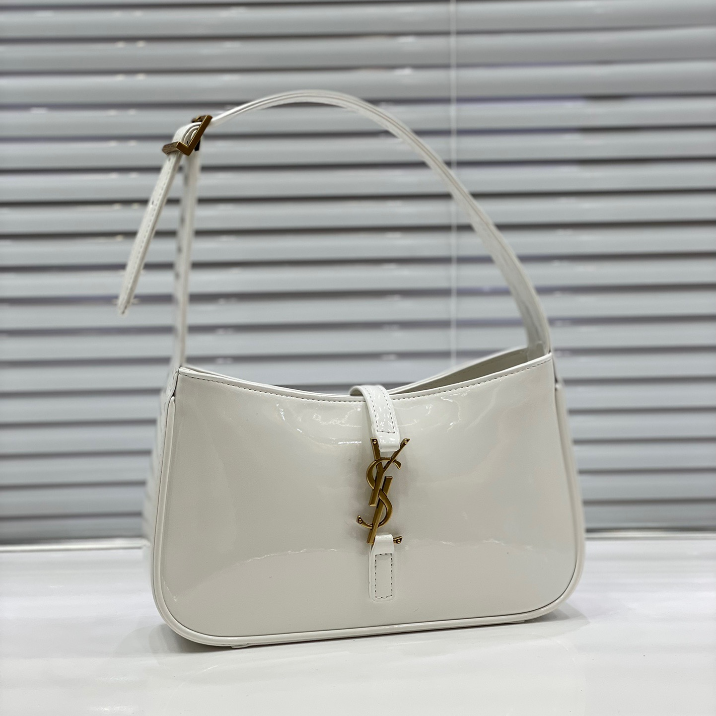 YSL-Lacquer leather armpit bag