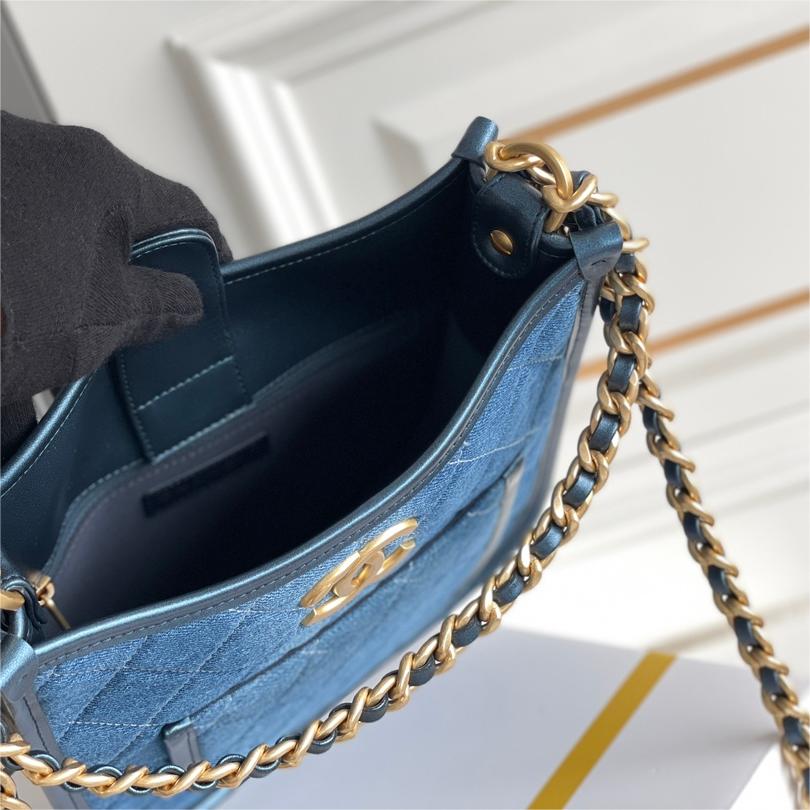 Chanel-Hippie bag washed with denim and gold metallic blue