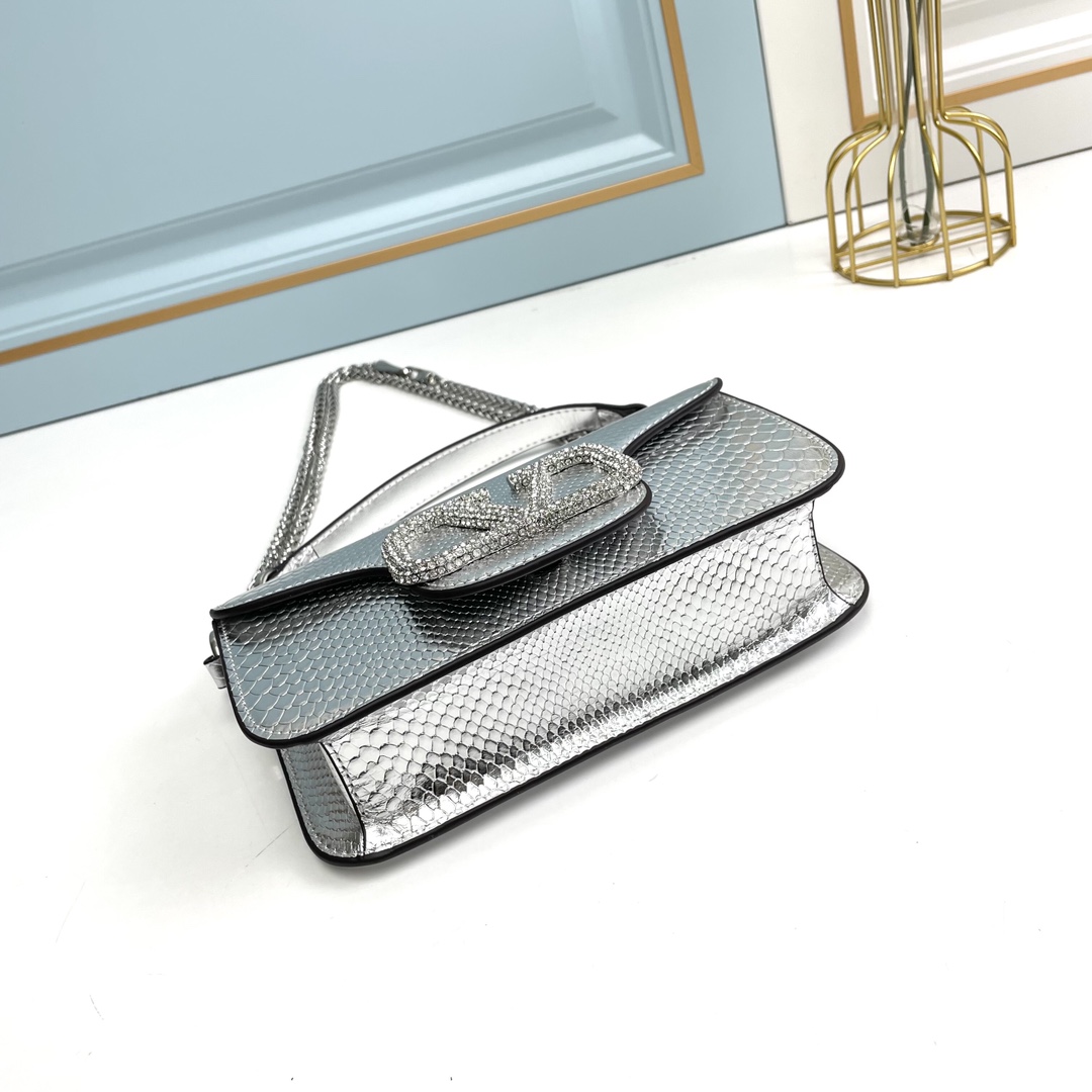 Valentino-Garavani MINI LOCÒ Snake patterned calf leather bag