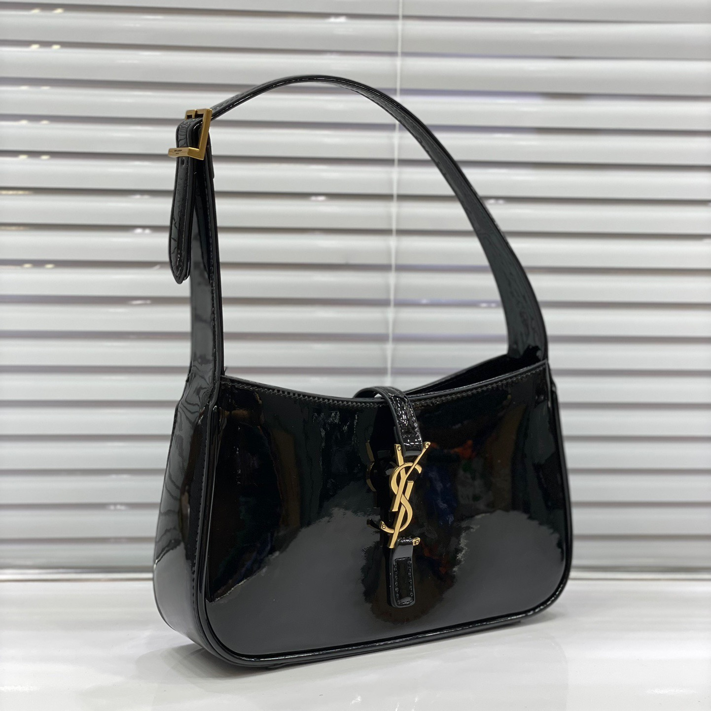 YSL-Lacquer leather armpit bag