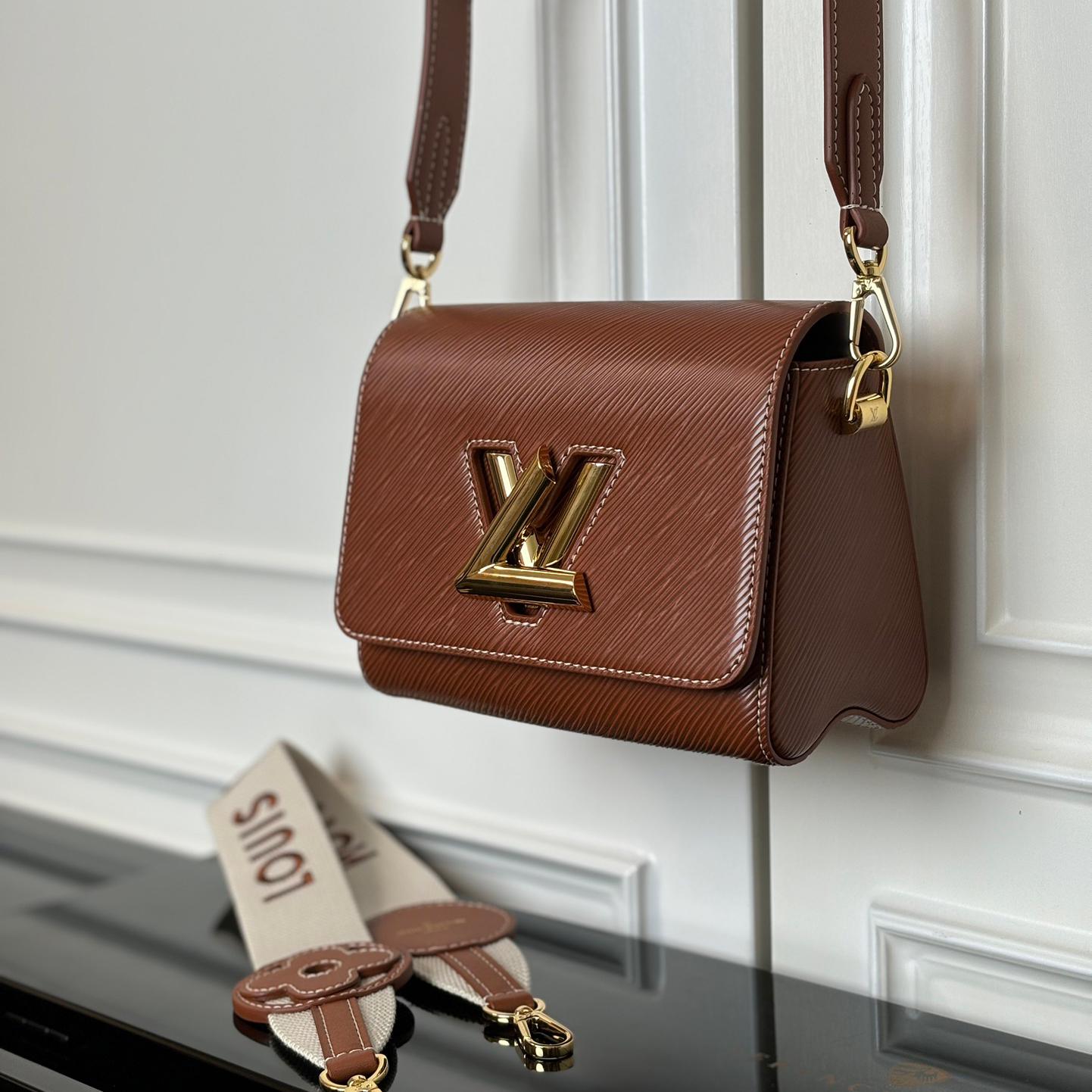 LV-twist traveler small handbag