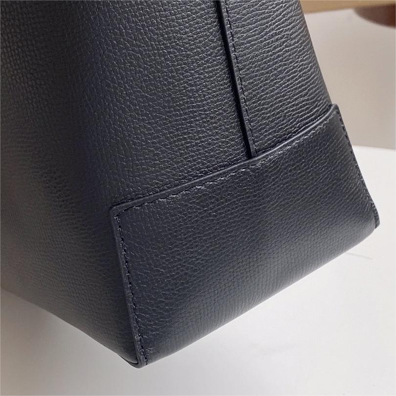 Burberry-Embossed badge leather tote bag